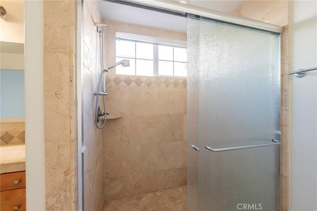 bathroom featuring walk in shower