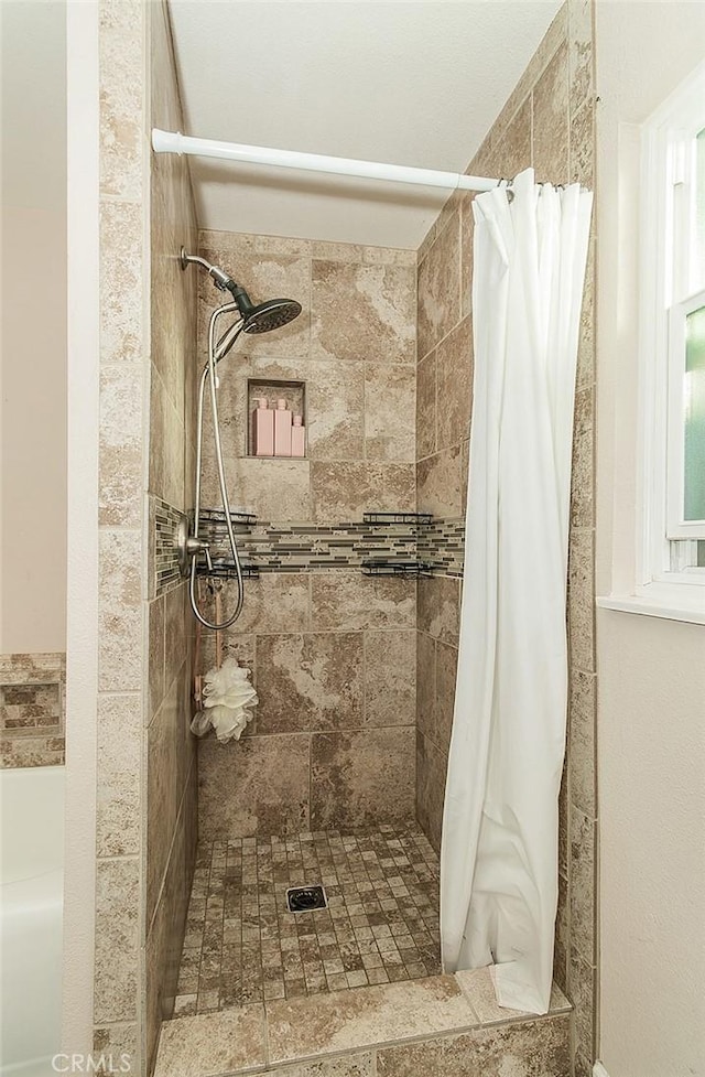 bathroom with walk in shower