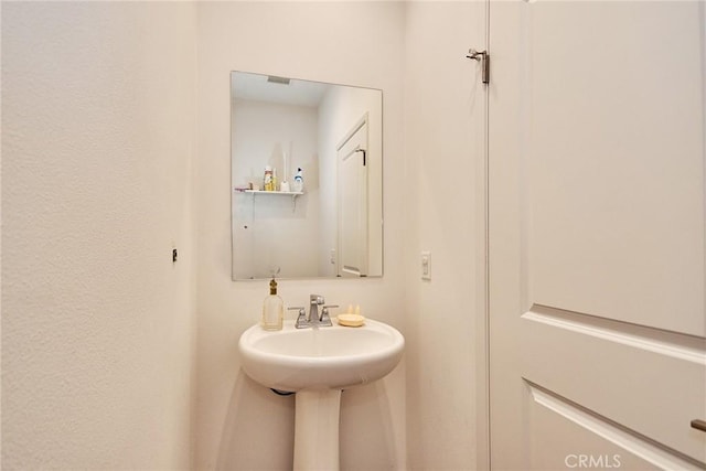 bathroom featuring sink