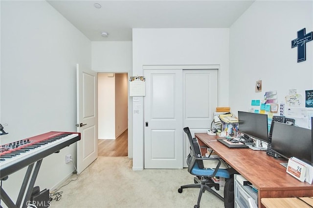 home office featuring light carpet