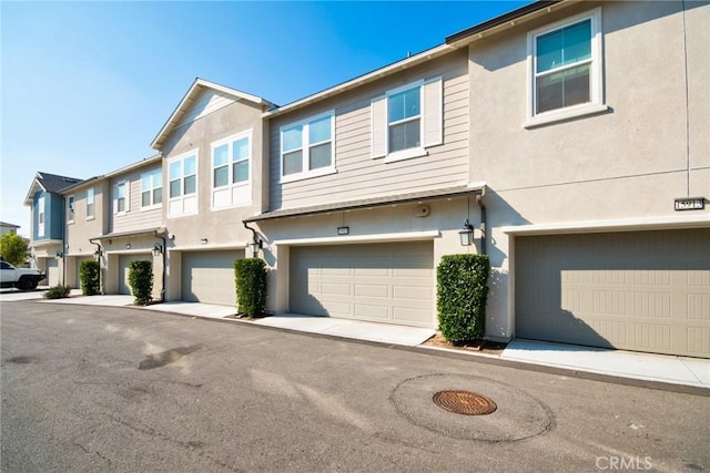 view of property featuring a garage