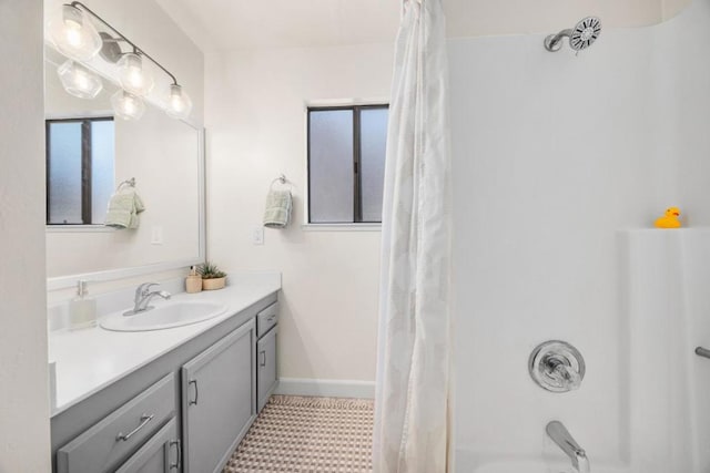 bathroom with vanity and shower / bath combo