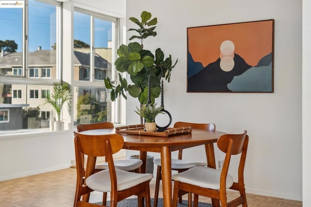 dining room with light parquet flooring