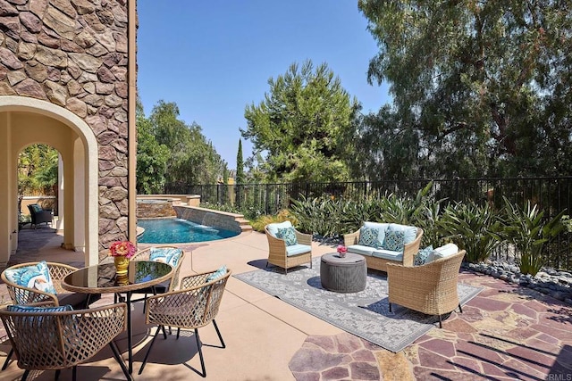 view of patio with a fenced backyard, an outdoor hangout area, and a fenced in pool