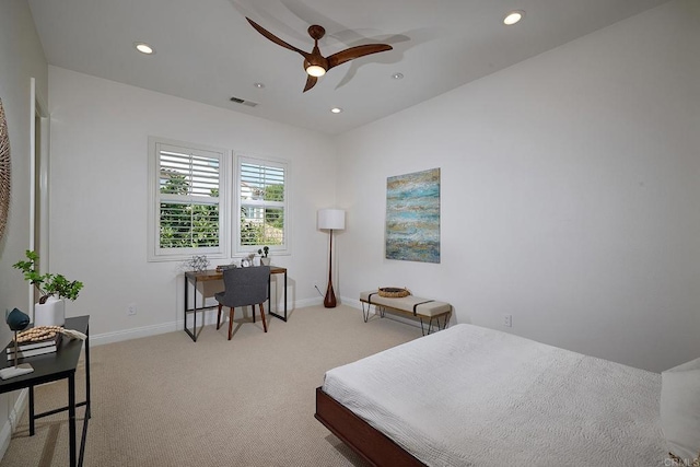 bedroom with light colored carpet, recessed lighting, visible vents, and baseboards