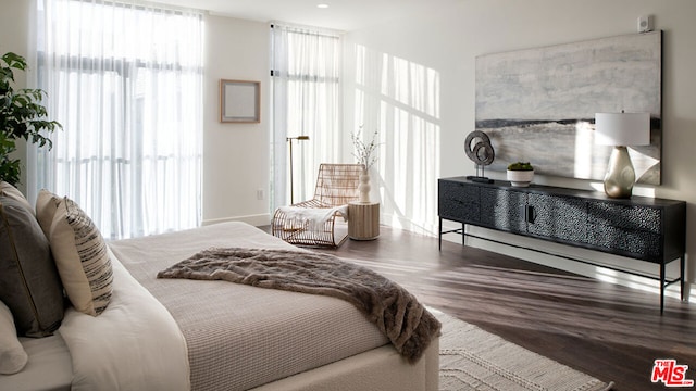 bedroom featuring hardwood / wood-style flooring