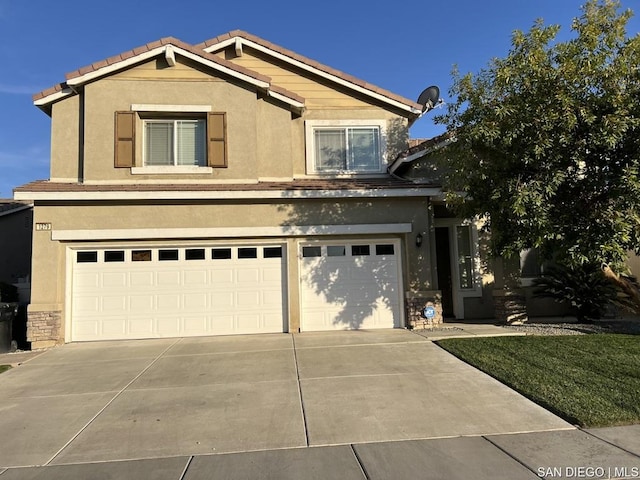 view of front of property with a garage