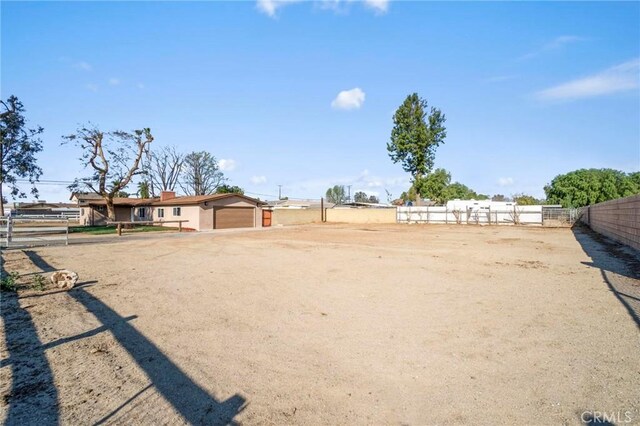 view of yard with a garage