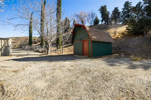 view of outbuilding featuring a rural view