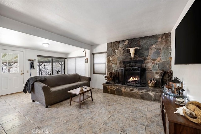 tiled living room with a fireplace