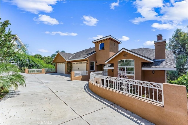 view of front of home with a garage