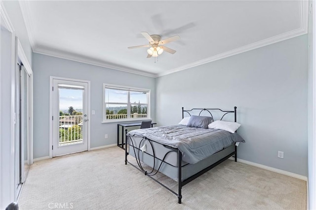 carpeted bedroom with ceiling fan, access to exterior, and ornamental molding