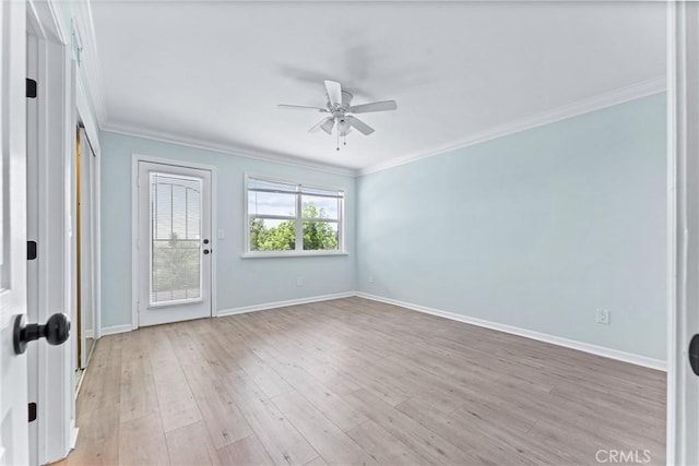 unfurnished room featuring ceiling fan, light hardwood / wood-style floors, and crown molding