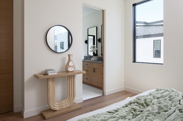 bedroom featuring light hardwood / wood-style floors