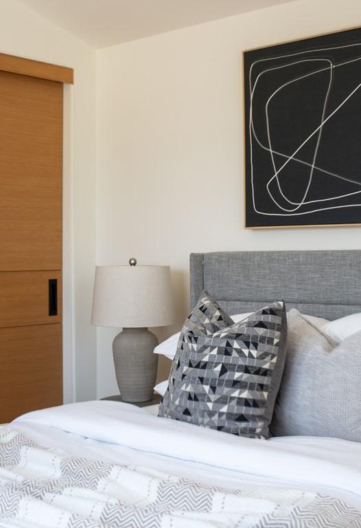 bedroom with vaulted ceiling