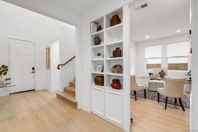 entrance foyer featuring light wood-type flooring