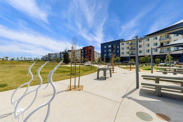 view of community featuring a lawn