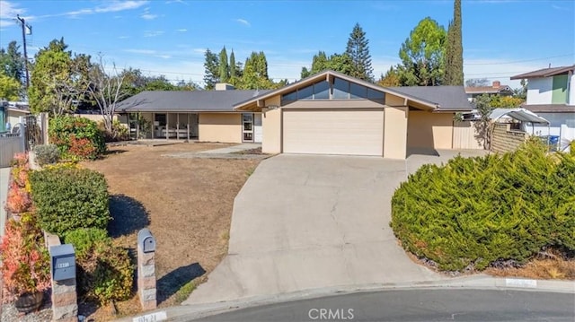 single story home with a garage