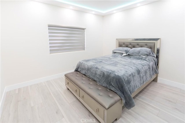 bedroom featuring light hardwood / wood-style floors