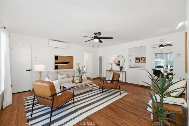 5536 Linden Ave, Long Beach, CA 90805 - living area featuring a ceiling fan, baseboards, wood finished floors, and a wall mounted air conditioner