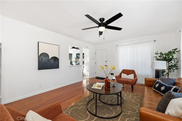 5536 Linden Ave, Long Beach, CA 90805 - living area featuring a ceiling fan, baseboards, and wood finished floors