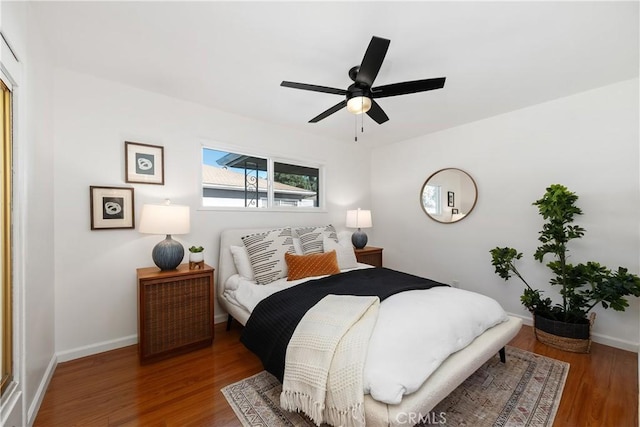 5536 Linden Ave, Long Beach, CA 90805 - bedroom featuring baseboards, ceiling fan, and wood finished floors