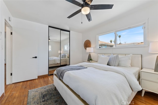 5536 Linden Ave, Long Beach, CA 90805 - bedroom with a closet, multiple windows, and light wood-style floors