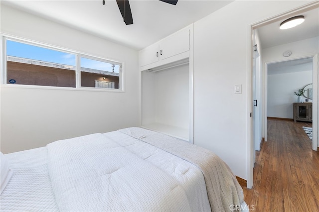 5536 Linden Ave, Long Beach, CA 90805 - bedroom featuring baseboards, ceiling fan, wood finished floors, and a closet