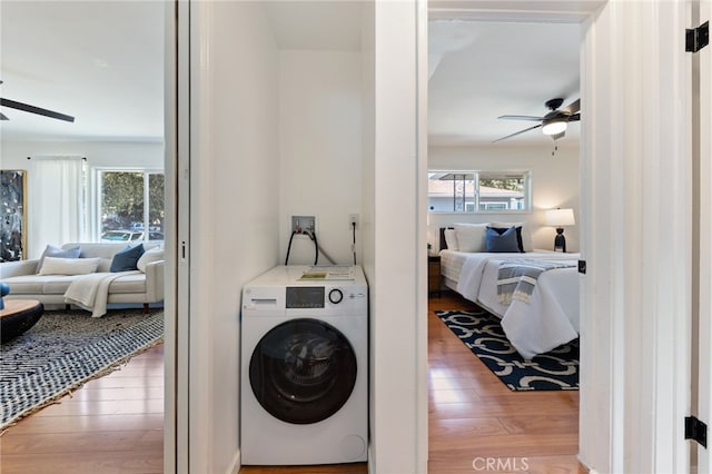 5536 Linden Ave, Long Beach, CA 90805 - laundry room with laundry area, a ceiling fan, washer / dryer, and wood finished floors