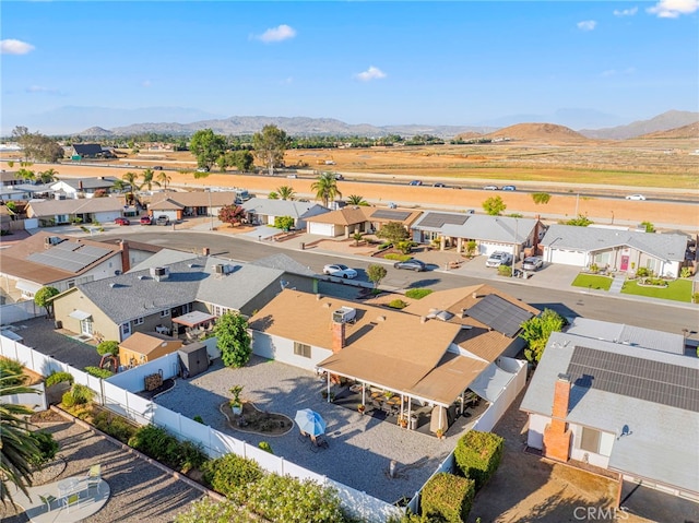 birds eye view of property featuring a mountain view