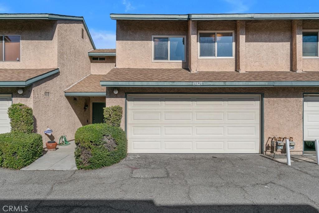 view of property featuring a garage