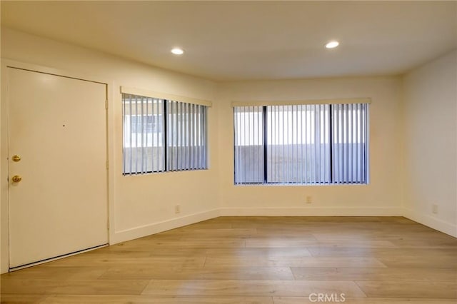 empty room featuring light hardwood / wood-style floors