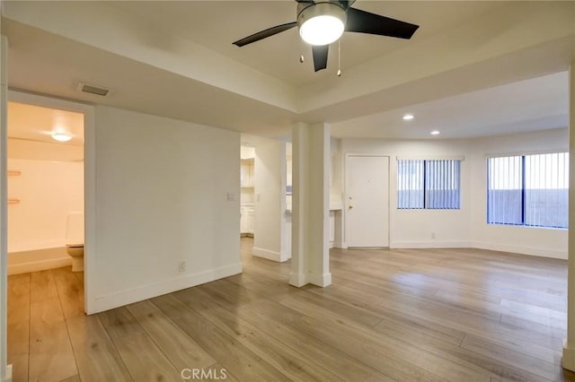 unfurnished room with light hardwood / wood-style floors and ceiling fan