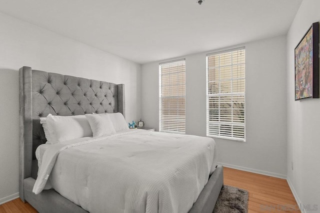 bedroom with light wood-type flooring