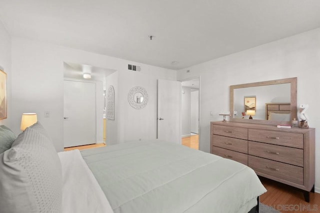 bedroom featuring wood-type flooring