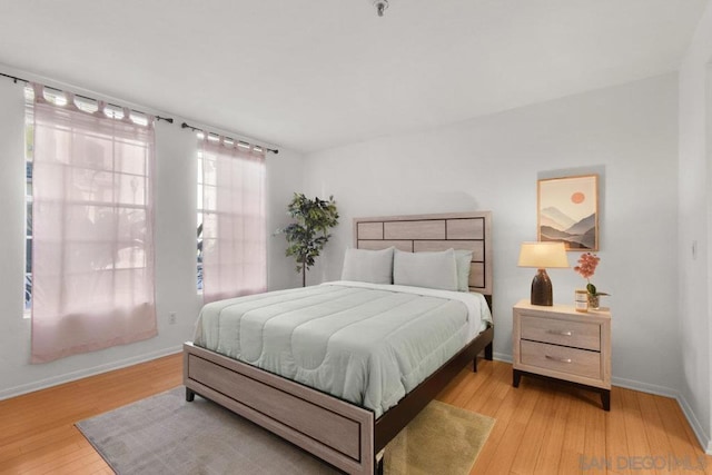 bedroom with light hardwood / wood-style flooring