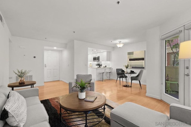 living room featuring light hardwood / wood-style flooring