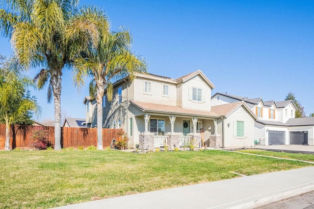 view of front of home featuring a front yard and a porch