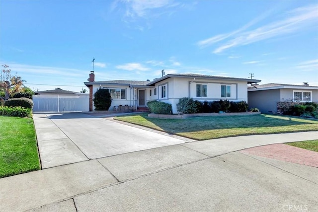 ranch-style house with a front yard