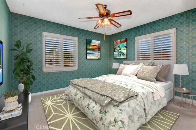 bedroom featuring ceiling fan and carpet flooring