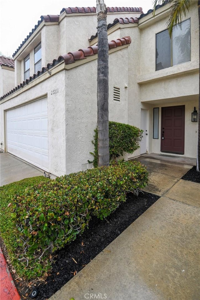 exterior space featuring a garage