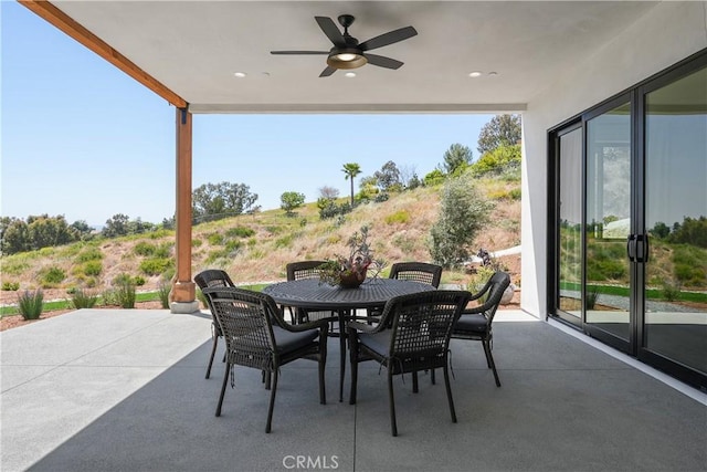 view of patio / terrace featuring ceiling fan