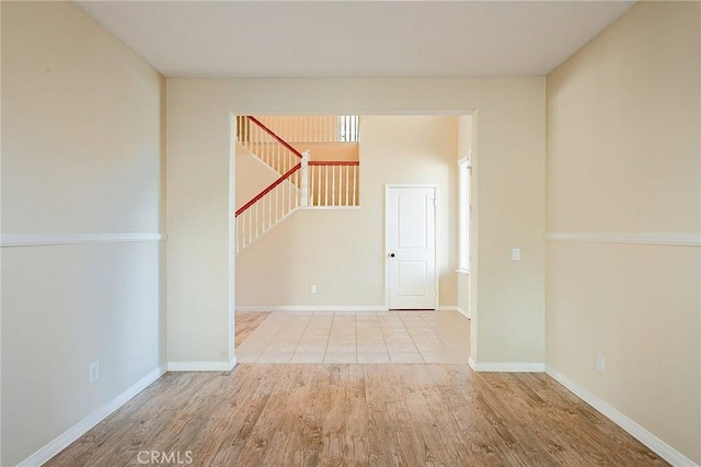 unfurnished room featuring light hardwood / wood-style flooring