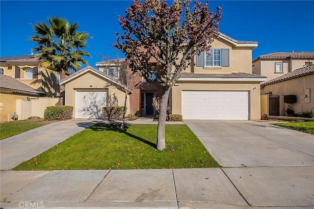 view of front of house featuring a garage and a front yard