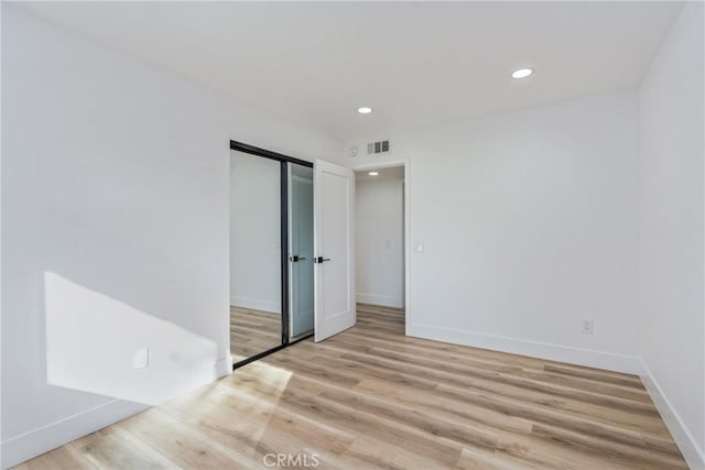 empty room featuring light hardwood / wood-style flooring