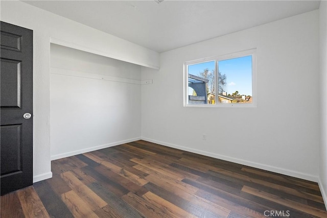 interior space with dark wood-type flooring