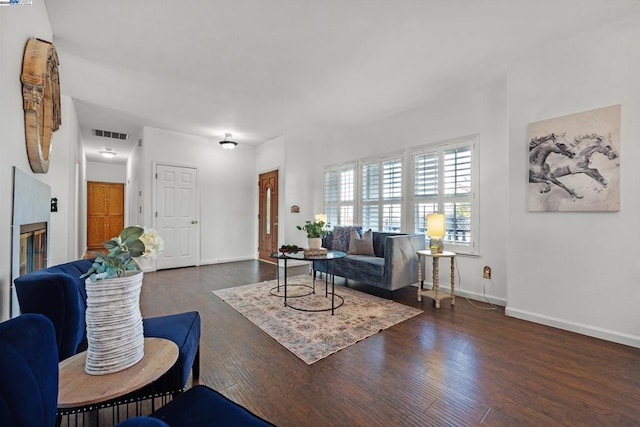 living room with dark wood-type flooring