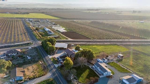 birds eye view of property with a rural view