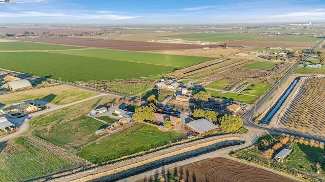 birds eye view of property featuring a rural view