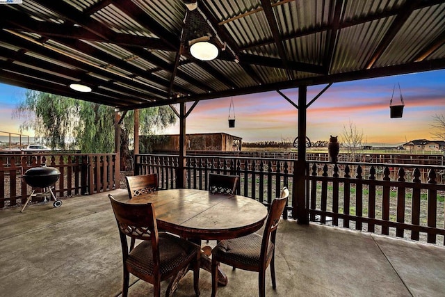 patio terrace at dusk with grilling area